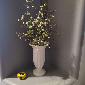 Ceramic vase with faux floral arrangements